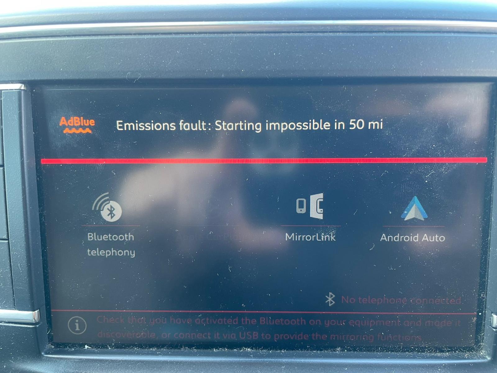 Audi dashboard showing AdBlue DEF fault warning, no restart in 650 miles