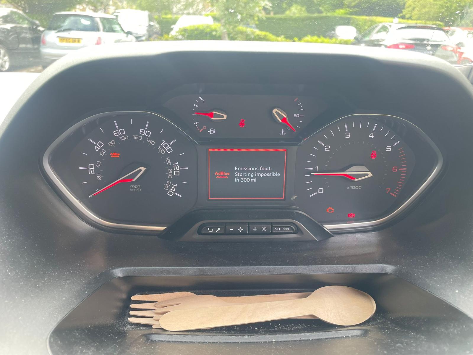 Audi dashboard showing AdBlue DEF fault warning, no restart in 650 miles