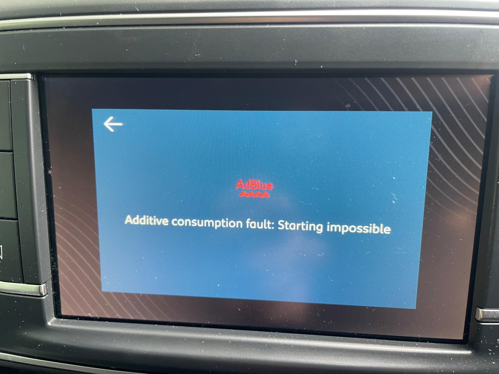 Audi dashboard showing AdBlue DEF fault warning, no restart in 650 miles